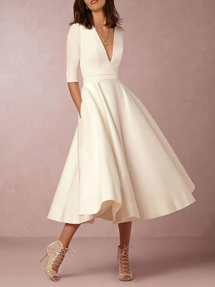 Women’s V-neck Midi Dress with A-line Skirt and Three Quarter Sleeves